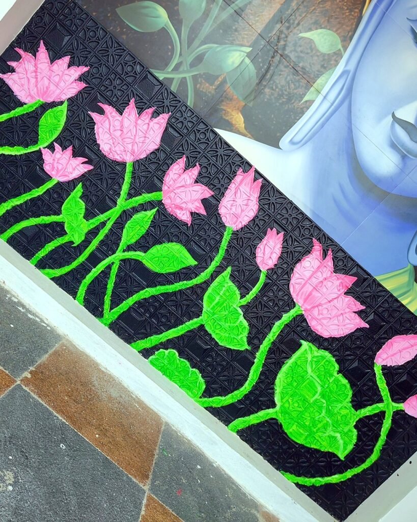 Lotus wall painting on a rough textured wall
