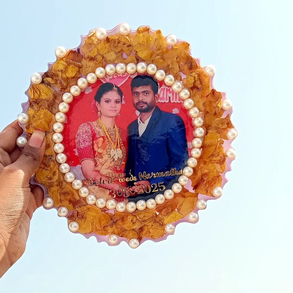 Wedding varmala preserved in resin with couple photo